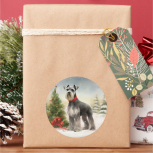 Sticker Rond Chien Schnauzer dans la neige de Noël