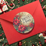 Sticker Rond Christ Est Né Noël Poinsettia Religieux<br><div class="desc">Célébrez la naissance du Christ avec cet élégant autocollant de Noël de style vintage. Doté de poinsettias rouges vibrantes entourant le message joliment écrit "CHRIST IS BORN", cet autocollant évoque la chaleur et la joie de la saison. Les couleurs douces et feutrées du design et le charme classique en font...</div>