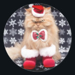 Sticker Rond Christmas Cat<br><div class="desc">Garfi Chat Perse de Noël Orange habillé en Père Noël Pailles en bottes rouges et assorti chapeau santa et cravate arc rayé.Garfi aime s'habiller dans les différentes tenues et est toujours parfait image.Cet autocollant est parfait pour décorer vos cartes de Noël, cadeaux, ou tout autre projet créatif avec une touche...</div>