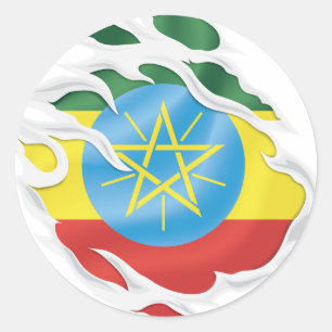 Sticker rond classique pour drapeau déchiré en Éth
