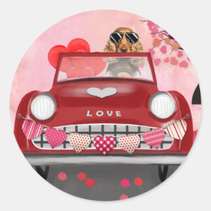 Sticker Rond Cocker Spaniel Conduisant une Voiture avec des Cœu