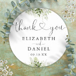 Sticker Rond Coeur verdoyant Script Merci Mariage Faveur<br><div class="desc">Élégant script de coeur floral vert merci autocollant personnalisé avec vos noms et date spéciale. Conçu par Thisisnotme©</div>