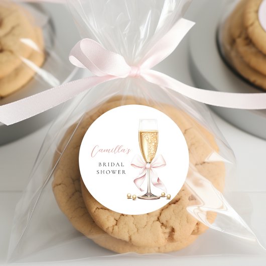 Sticker Rond Collier de perles roses et bow de prosecco pour en