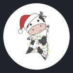 Sticker Rond Cow Cheerful Christmas Winter Animals<br><div class="desc">The cow at Christmas with fairy lights. Funny animals with toxits and snow for the holidays. Donc Funny for Christmas in July. Cows are cute animals et perfect pour Christmas.</div>