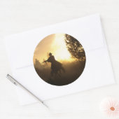Sticker Rond Cowboy avec Lasso au coucher du soleil (Enveloppe)