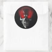 Sticker Rond Crâne aux yeux rouges brillants (Sac)