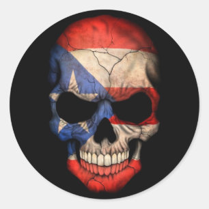 Sticker Rond Crâne portoricain de drapeau sur le noir