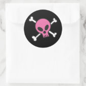 Sticker Rond Crâne rose et os croisés (Sac)