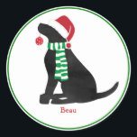 Sticker Rond Custom Christmas Black Labrador Holiday Dog<br><div class="desc">Festif de Noël personnalisé Black Lab Holiday Dog habillé en chapeau santa et écharpe verte et blanche tenant un ornement de noël pois rouge dans sa bouche. Mignonne autocollant noir de noël de laboratoire pour les amateurs de labo! © EMR Designs.</div>