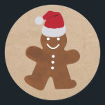 Sticker Rond Cute Christmas Gingerbread Homme Cookies Kraft<br><div class="desc">Un design mignon mettant en vedette d'adorables biscuits homme en pain d'épices portant des chapeaux de Père Noël sur un papier kraft brun look arrière - plan. Parfait pour la saison festive de Noël pour tous ceux qui aiment la cuisine,  Noël,  les célébrations et les dessins mignons.</div>