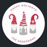 Sticker Rond Cute Christmas Gnomes<br><div class="desc">Un autocollant simple et mignon de style nordique avec trois mignons gnomes de Noël scandinaves avec des casquettes rouges saisonniers et des tuniques grises. Vous pouvez personnaliser un "Joyeux Fêtes,  "Joyeux Noël",  etc.,  salutation et votre nom dans une simple typographie moderne.</div>
