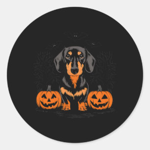 Sticker Rond Dachshund noir et feu Halloween avec