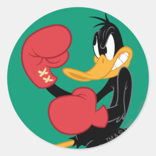 Sticker Rond DAFFY DUCK™ la boîte