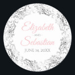Sticker Rond Dentelle d'argent et script rose Élégant Mariage b<br><div class="desc">Ces beaux autocollants de mariage présentent un élégant texte rose et gris sur un arrière - plan blanc avec une bordure en dentelle florale en faux argent. Le texte est entièrement personnalisable et contient les noms du couple mariage et la date du mariage. Parfait comme les étiquettes de faveur ou...</div>