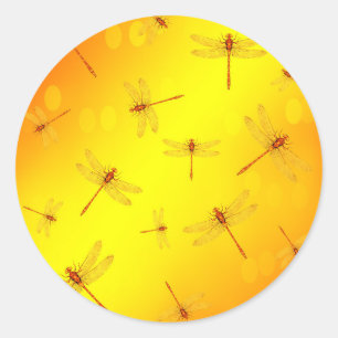 Sticker Rond Des libellules jaunes dorées volent,