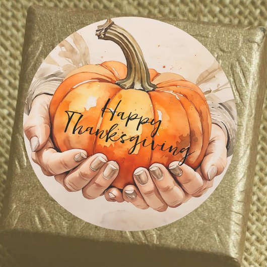 Sticker Rond Deux mains doucement tenir un Thanksgiving Citroui