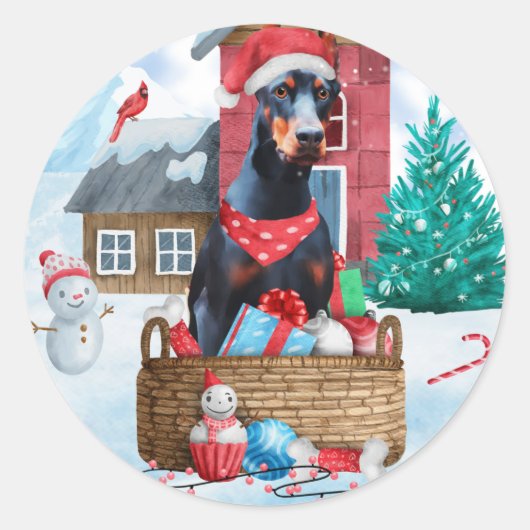 Sticker Rond Doberman dans une maison de Noël enneigée (Devant)
