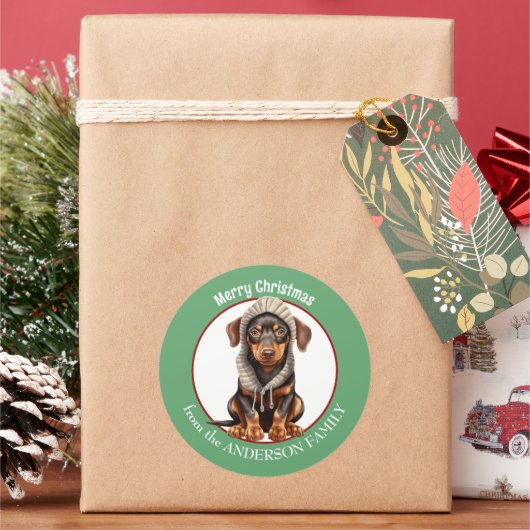 Sticker Rond Doberman Pinscher chiot en hiver Noël Casquette (vacances)