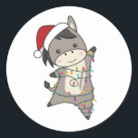 Sticker Rond Donkey Christmas Donkeys<br><div class="desc">The donkey for Christmas with fairy lights. Funny animals with toxits and snow to the holidays. Donc Funny for Christmas in July. Donkeys are sweet animals and perfect for Christmas.</div>