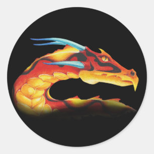 Sticker Rond Dragon rouge courageux avec les klaxons bleus