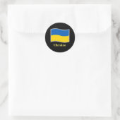 Sticker Rond Drapeau ukrainien brandissant (Sac)