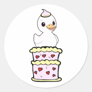Sticker Rond Drôle Canard sautant d'un gâteau