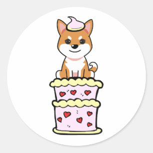 Sticker Rond Drôle chien orange sautant d'un gâteau