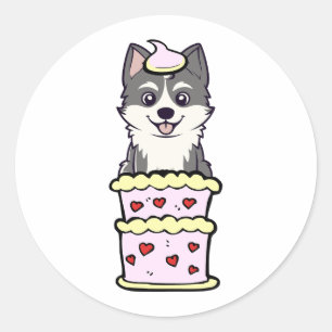 Sticker Rond Drôle husky sautant d'un gâteau