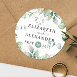 Sticker Rond Elégant nom d'eucalyptus vert et date mariage<br><div class="desc">Cet autocollant rond mariage floral romantique et élégant fait le sceau parfait pour votre mariage, présentant un design botanique chic qui dispose d'un bouquet classe de verdure aquarelle claire et aérée et feuilles eucalyptus complété par des speckles dorés de citron (imprimé) et est facilement personnalisable avec vos noms et date...</div>