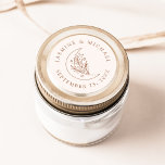 Sticker Rond Élégante Lune et Étoiles Terracotta Mariage Favori<br><div class="desc">Ajoutez une touche personnalisée à vos enveloppes, faveurs de mariage, et plus encore avec ces stickers de mariage Elegant Moon et Stars en terre cuite. Le design présente une ligne d'art en terre cuite illustrant une lune ornée d'étoiles et de feuillage sur un arrière - plan crème. Vos noms et...</div>
