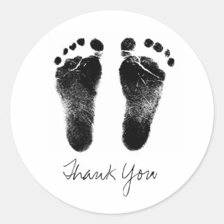 Sticker Rond Empreintes de bébé noir et blanc