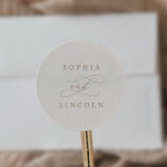 Sticker Rond Enveloppe romantique en or et en ivoire Mariage<br><div class="desc">Ces enveloppes romantiques d'or et d'ivoire mariage sont parfaites pour un simple mariage. Le design classique moderne comprend des tourbillons fantaisistes et des fleurs fantaisistes avec une magnifique typographie de feuille d'or en faux champagne. Personnalisez le étiquette avec les noms de la mariée et du marié. Remarque : Ce design...</div>