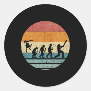 Sticker Rond Évolution Rétro Vintage de Silhouette de Joueur de