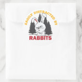 Sticker Rond facilement distrait par des lapins (Sac)