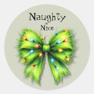 Sticker Rond Festive Green Furry Bow-Lights Naughty ou Nice