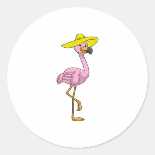 Sticker Rond Flamant rose sur la plage avec Casquette