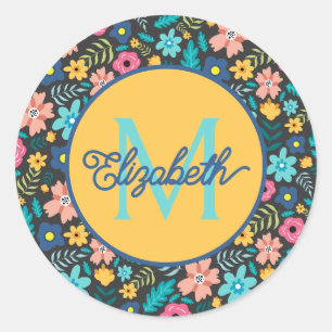 Sticker Rond Fleurs roses et bleues sur monogramme noir