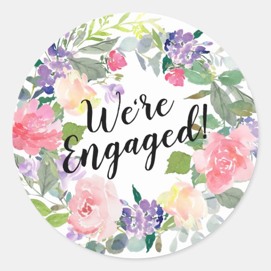 Sticker Rond Fleurs roses et violettes Nous sommes engagés dans (Devant)