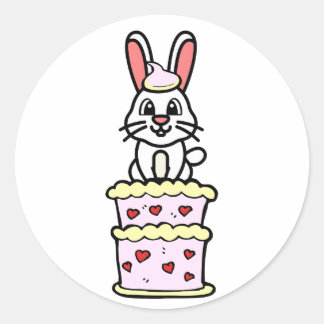 Sticker Rond Funny Rabbit sautant d'un gâteau