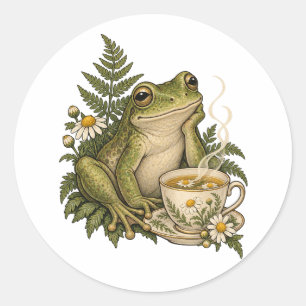 Sticker Rond Grenouille confortable avec du thé à la camomille