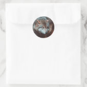 Sticker Rond Grey Wolf looking in the forest (Sac)