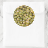 Sticker Rond Gros plan sur des olives vertes (Sac)