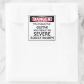 Sticker Rond Guitare de danger (Sac)