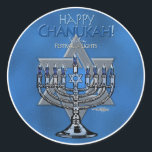 Sticker Rond Happy Chanukah - Menora & Star de David<br><div class="desc">L'éclairage de la chandelabra, connue sous le nom de Hanukiyah ou la Menorah, est l'une des traditions et pratiques entourant la célébration de l'Hanoukka. Les symboles juifs célèbrent la saison Hanoukka dans cette conception, avec les mots "Happy Chanukah" - "Festival des lumières". L'étoile bleue de David fait référence aux six...</div>