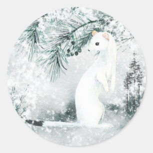 Sticker Rond Hermine blanche arctique tempêtant la forêt hivern