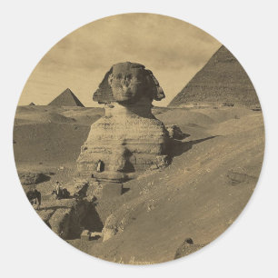 Sticker Rond Hommes et chameaux sur la patte du sphinx,