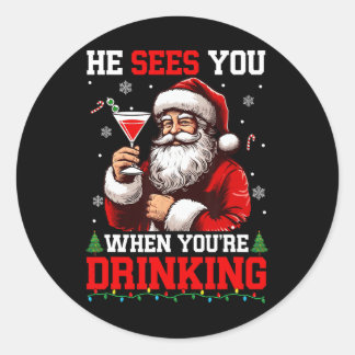 Sticker Rond Il voit quand tu bois Noël Père Noël boit T