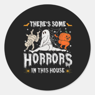 Sticker Rond Il y a des horreurs dans cette maison Citrouille f