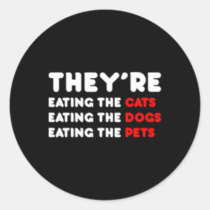 Sticker Rond Ils mangent les chiens - Ils mangent les chats
