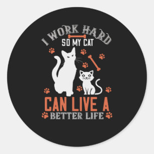 Sticker Rond Je travaille dur pour que mon chat puisse vivre un